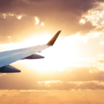 Image of an airplane with sun