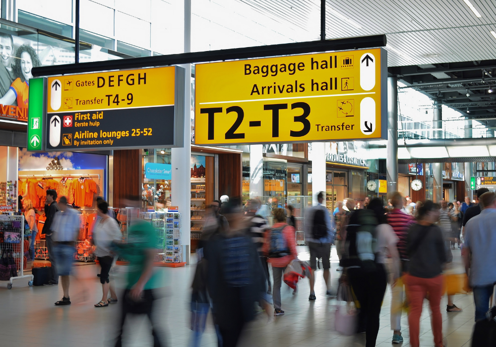 airport with people and signs